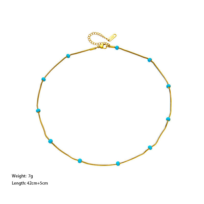 The Solace Necklace green and gold-tone product detail