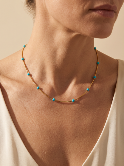 The Solace Necklace worn by model